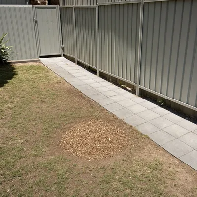 After: Old ironbark stump heaving a paver path, Newcastle